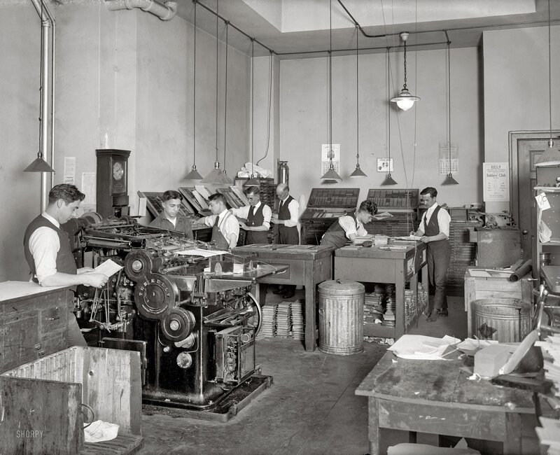 Men Operating Printing Press