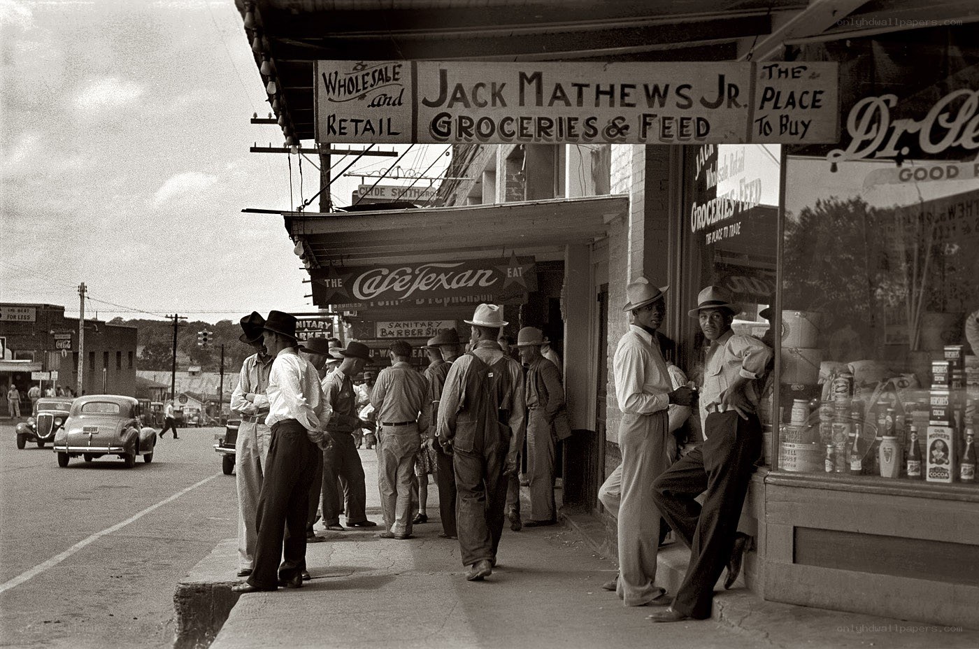 Men outside a grocery store