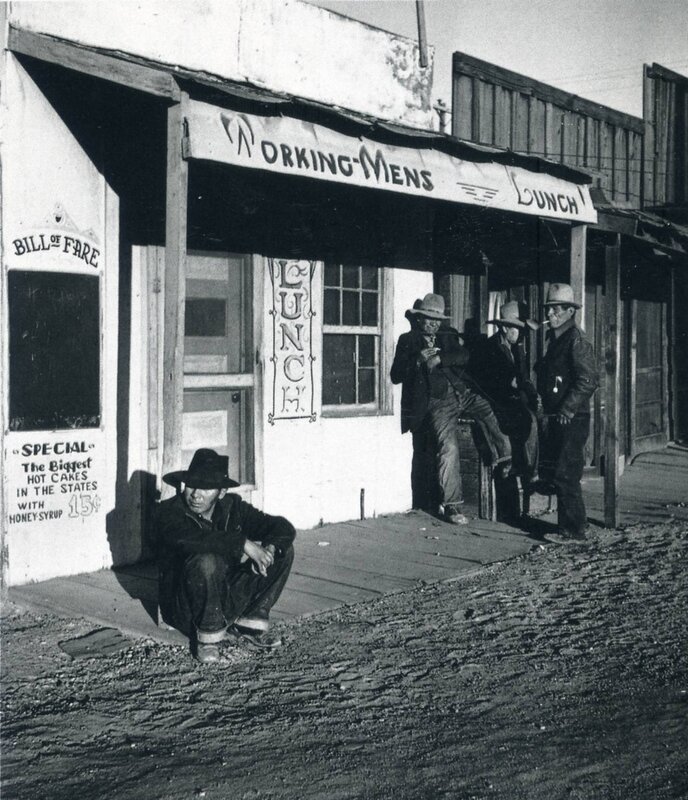 Men outside a lunch counter