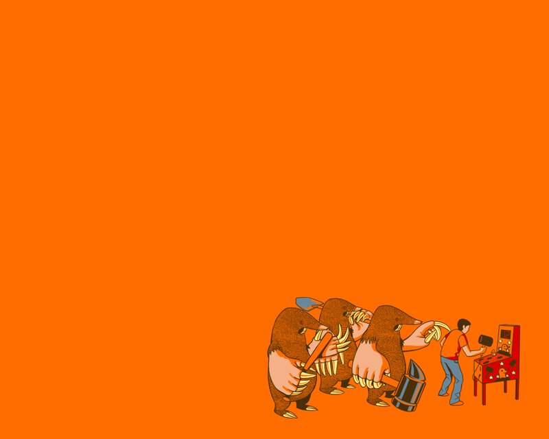 Men Playing Arcade Game — Orange
