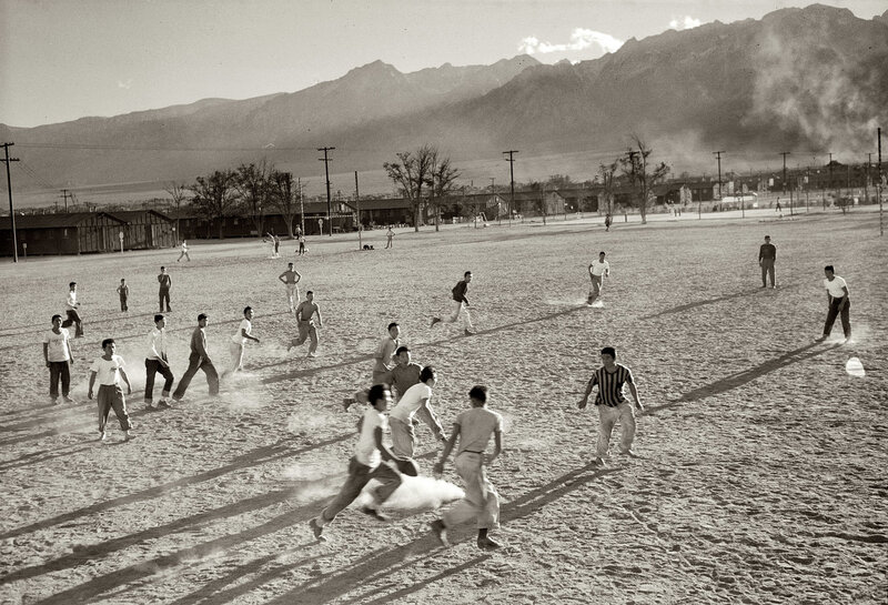 Men playing football on a field