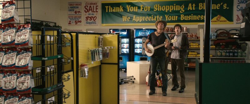 Men playing instruments in grocery store