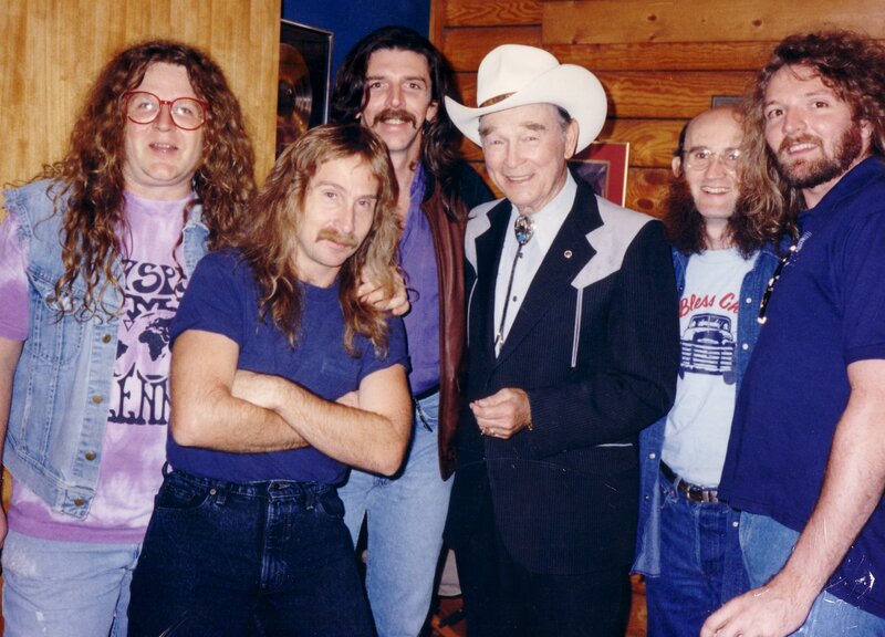 Men Posing with Cowboy