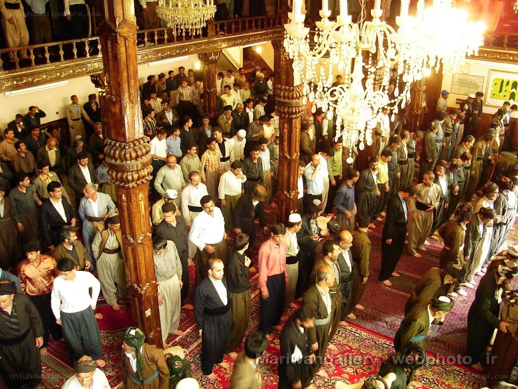 Men praying in a mosque