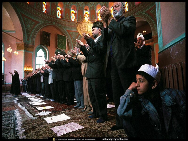 Men praying in a mosque