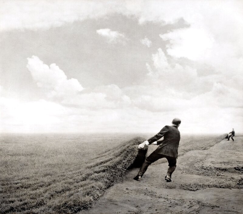 Men Rolling Grass Carpet
