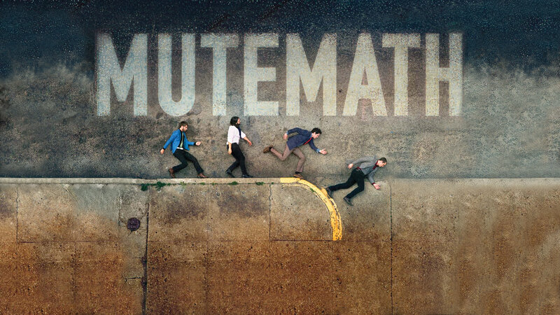 Men running from a wall