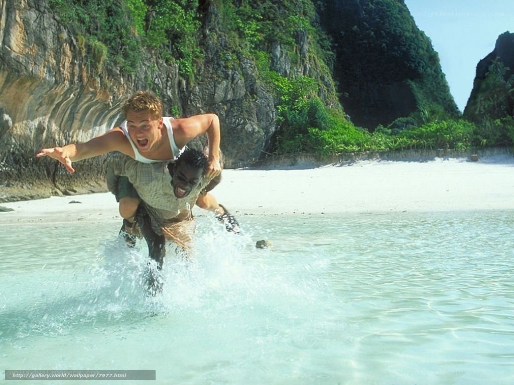 men running on beach
