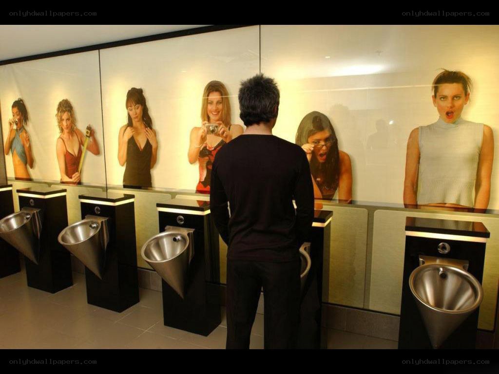 men's restroom with art installation