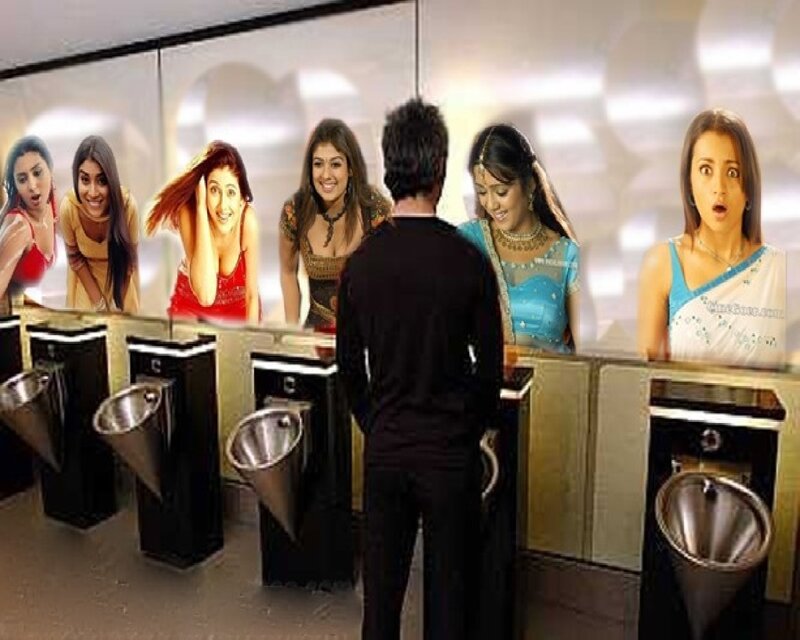 Men's restroom with women in mirrors