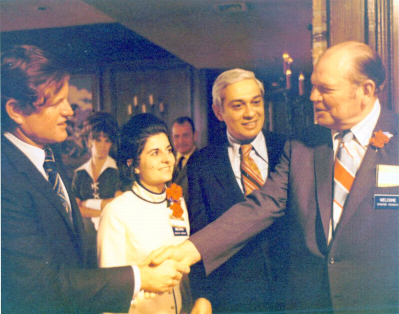 Men shaking hands at event