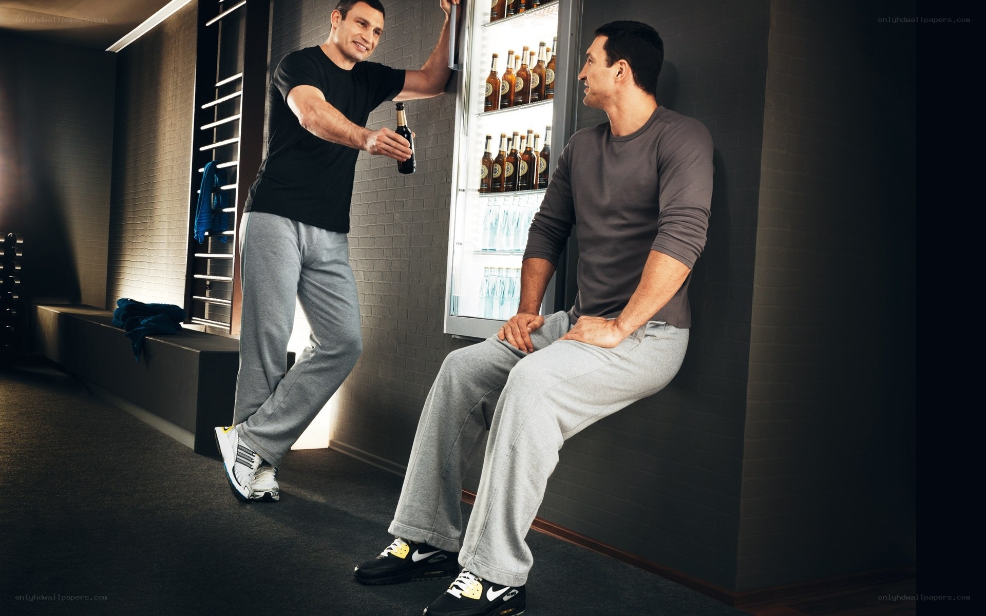 Men sharing a drink after workout