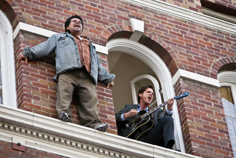 Men singing on a building