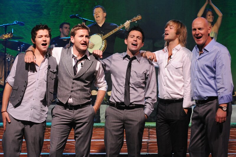 Men Singing on Stage