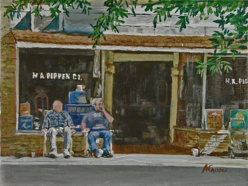 Men sitting outside a shop