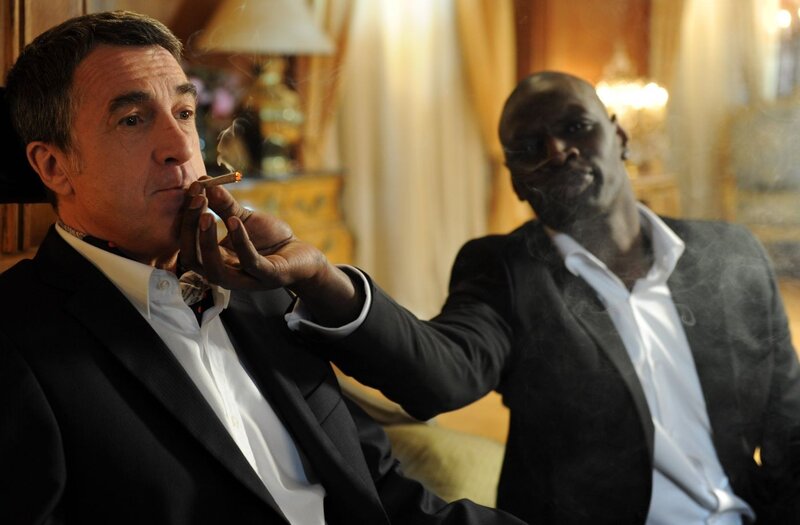 Men smoking cigars in a room