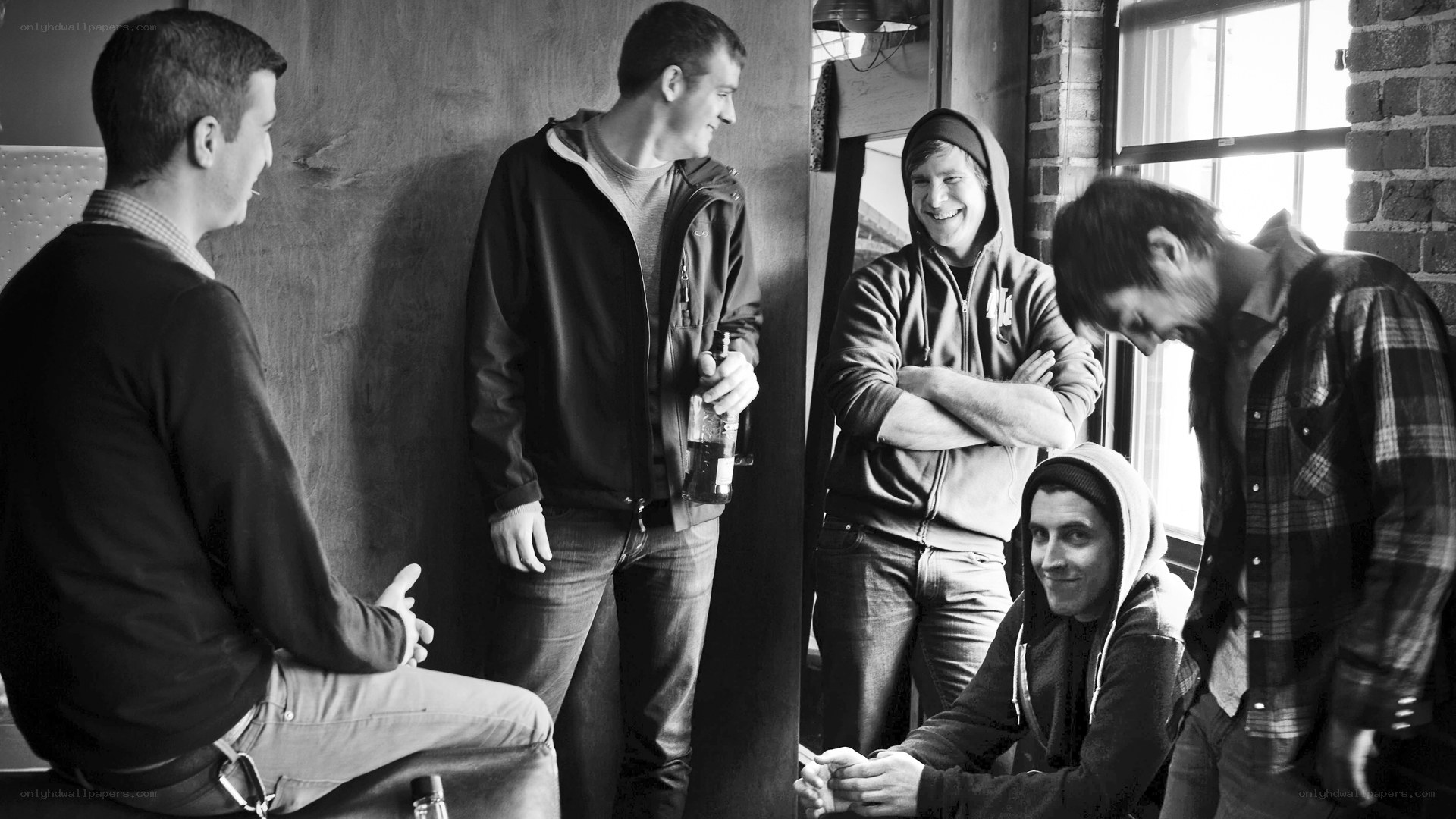 men socializing in a room