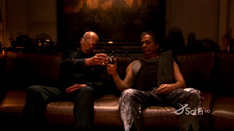 men toasting on couch