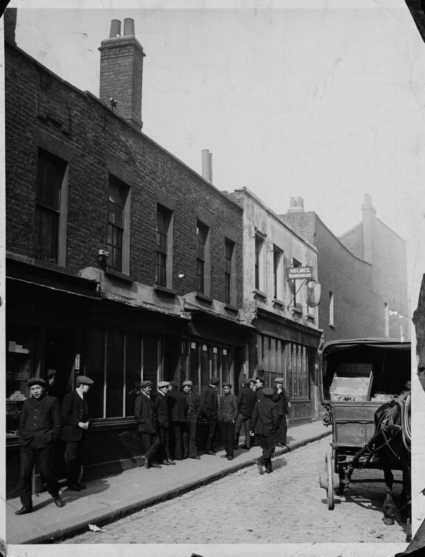 Men waiting on a London street