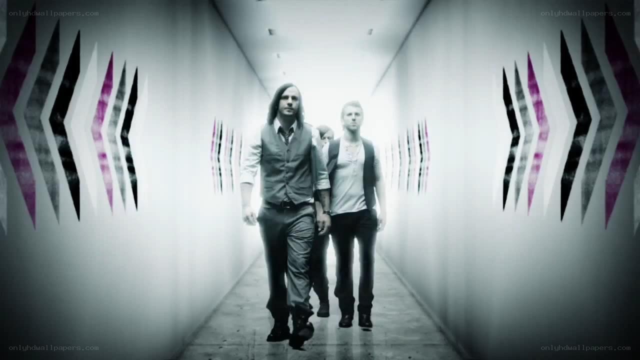 men walking in a hallway