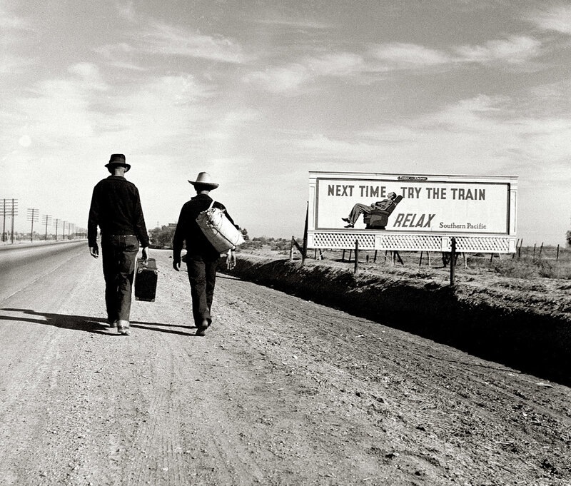 Men walking on a road