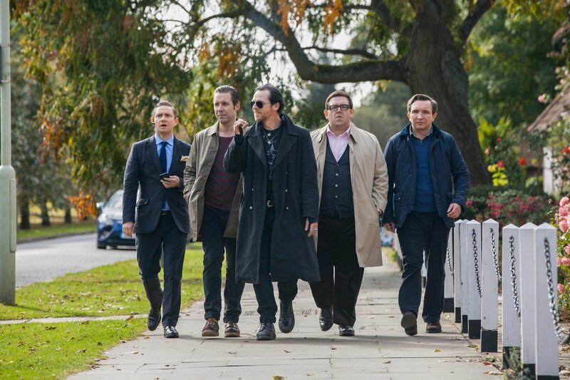 men walking on sidewalk