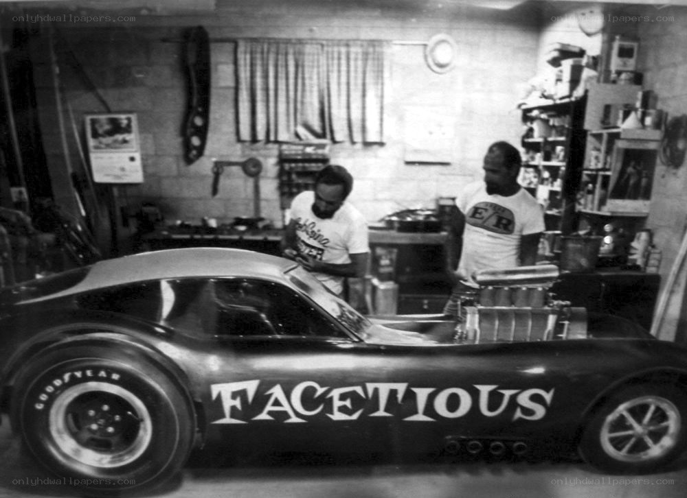 Men with a drag racing car