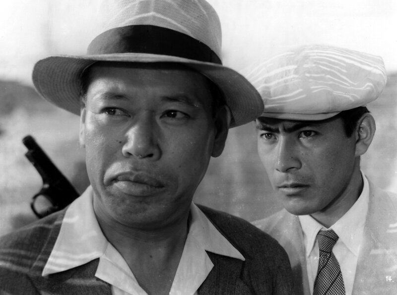 Men with a gun in black and white