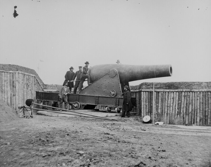 Men with a large cannon