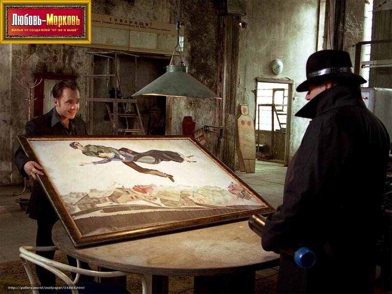 Men with a painting in a workshop