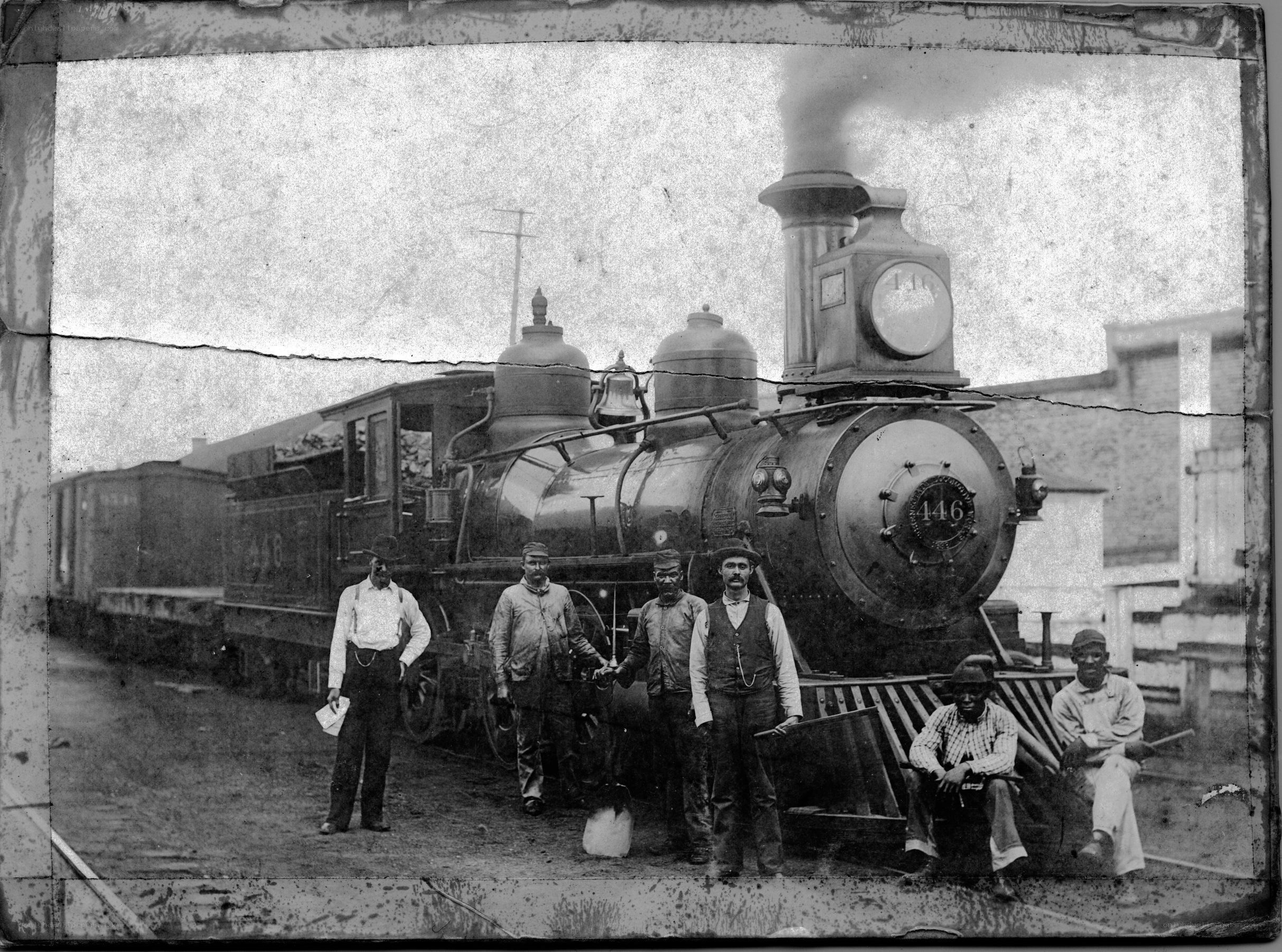 Men with a steam locomotive