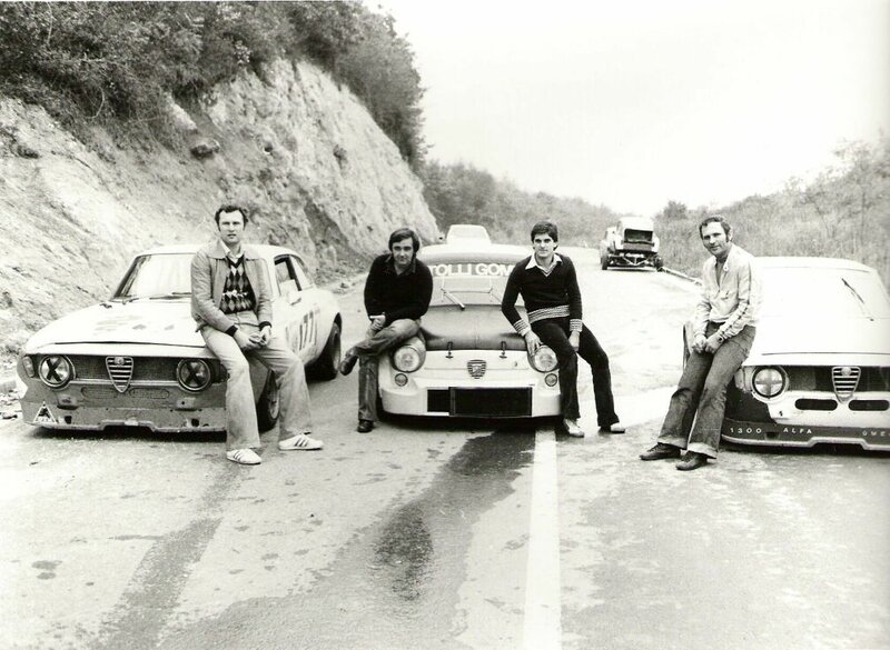 Men with Alfa Romeo race cars