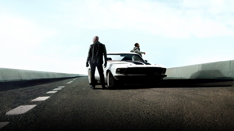 Men with classic car on highway