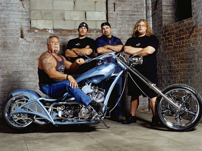 Men with custom motorcycle