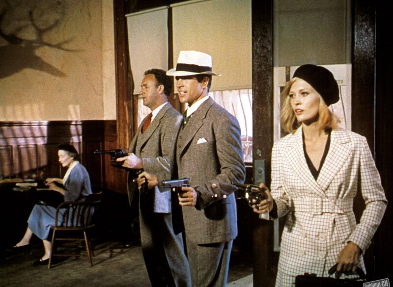 Men with guns in a room