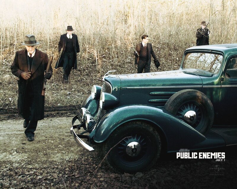 Men with Guns Near Car