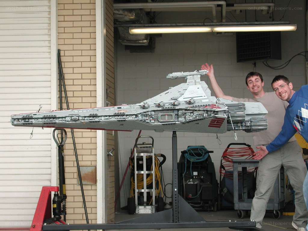 Men with large LEGO starship model