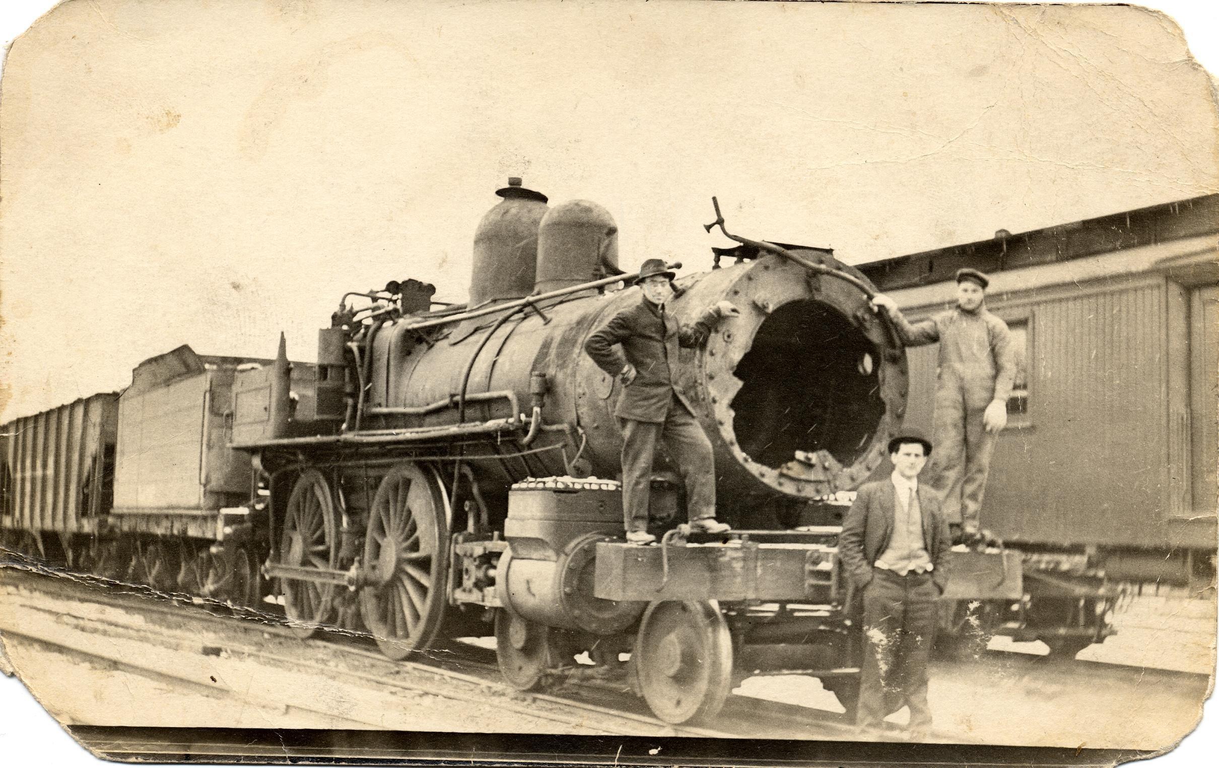Men with steam locomotive