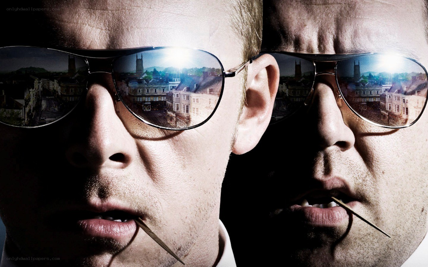 Men with sunglasses and toothpicks