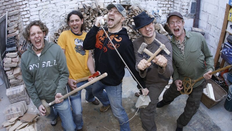 Men with tools in yard