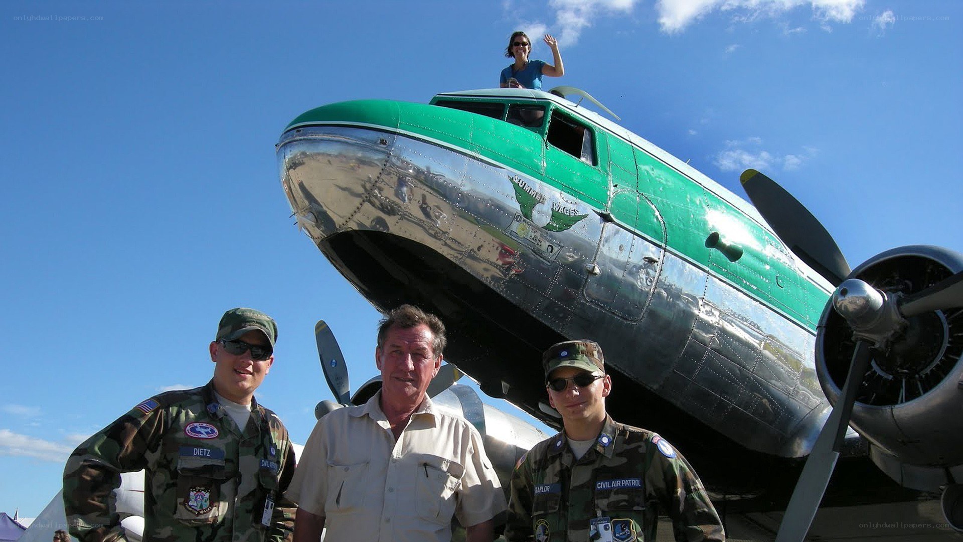 Men with vintage airplane