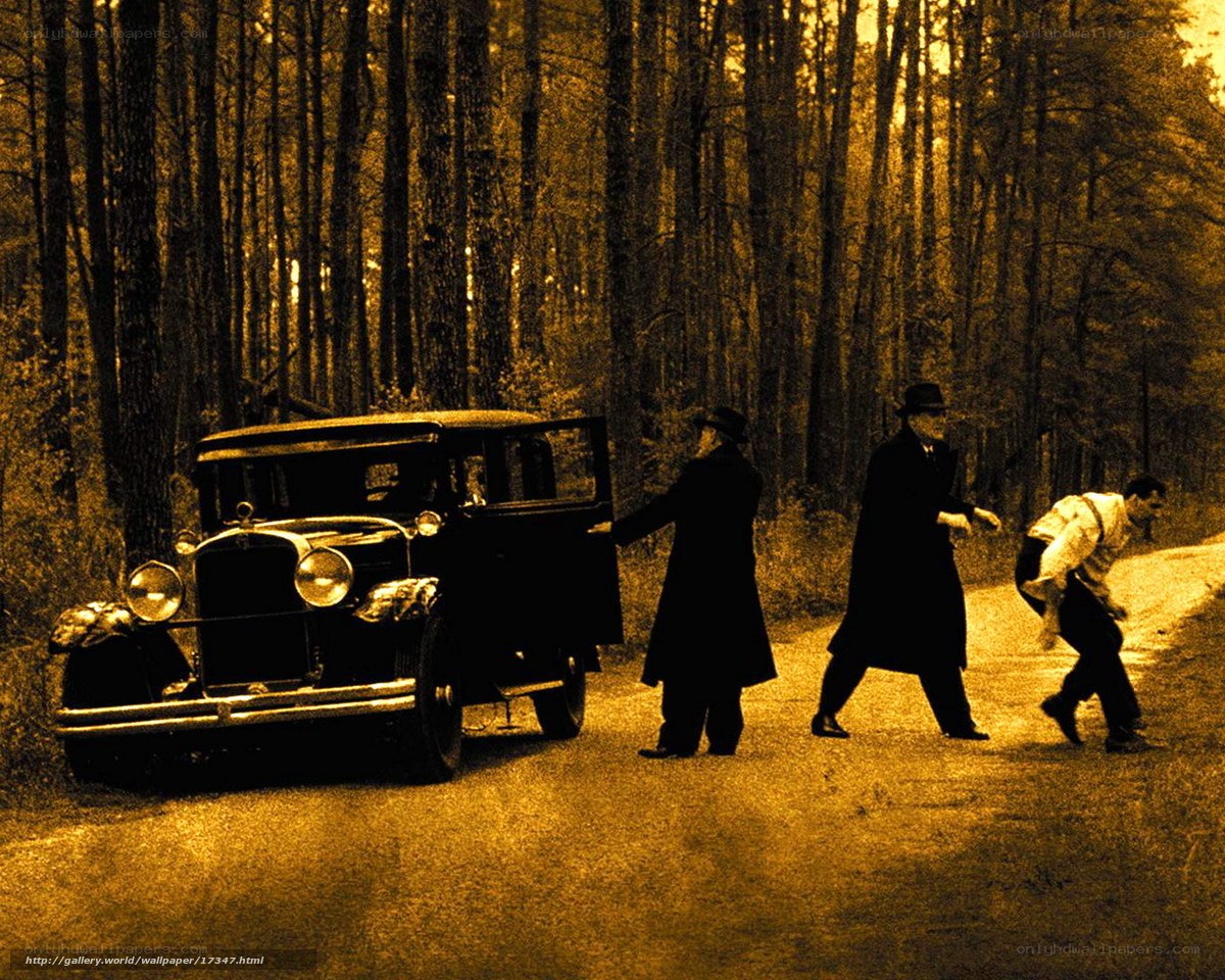 Men with vintage car in forest
