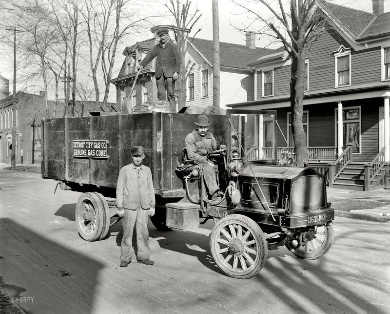 Men with vintage gas truck