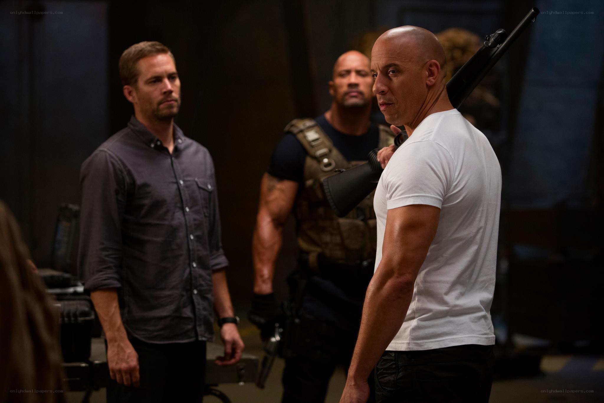 men with weapons in dark room