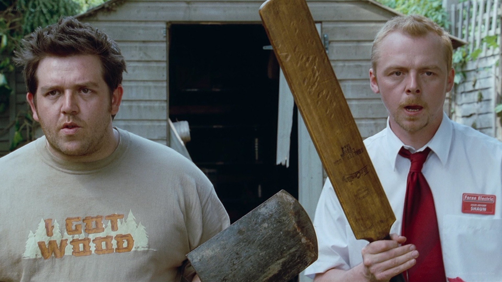 Men with weapons in garden