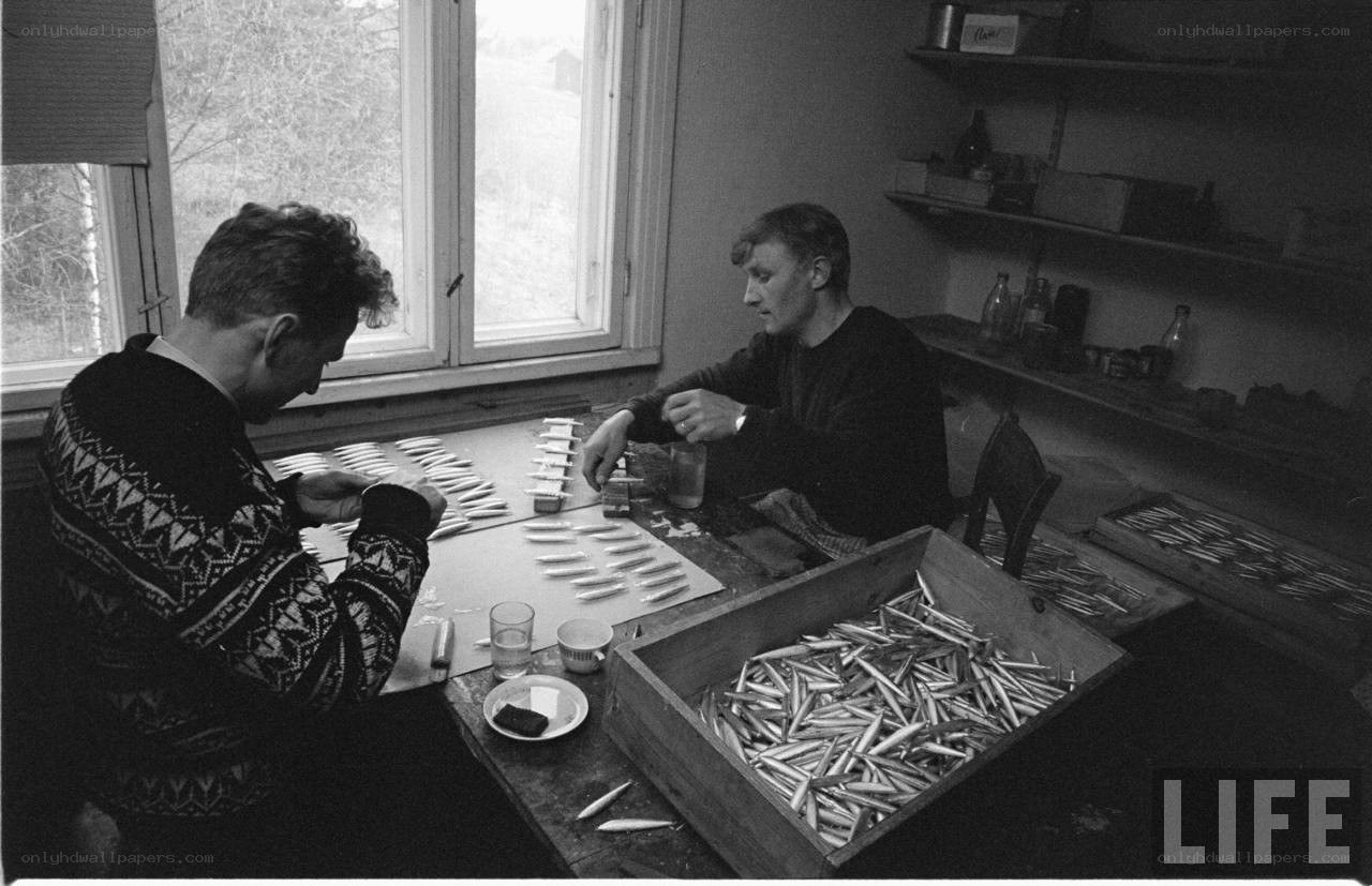 Men working with fishing lures