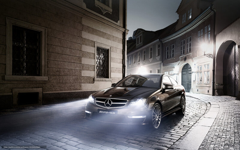 Mercedes-AMG on cobblestone street