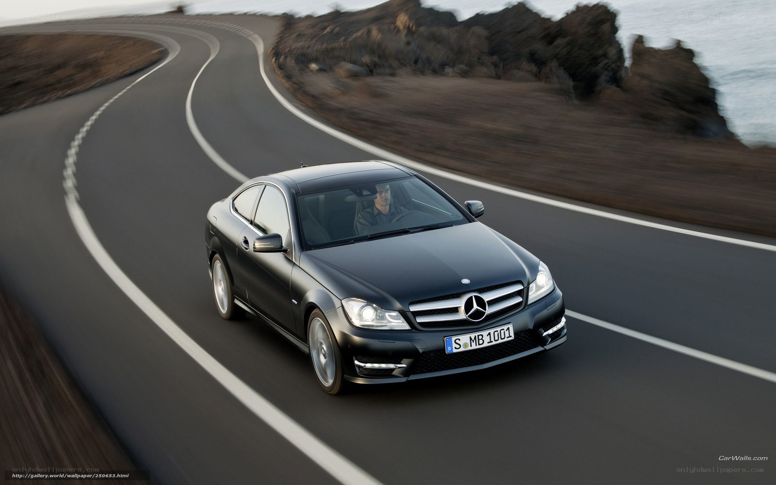 Mercedes-Benz C-Class Coupe on coastal road