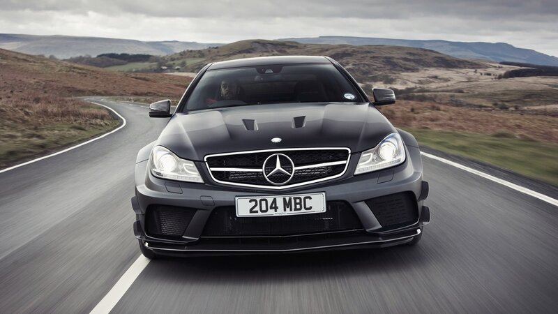 Mercedes-Benz C63 AMG driving on road
