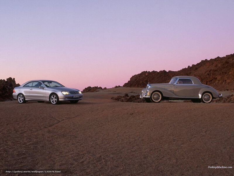 Mercedes-Benz cars at dusk